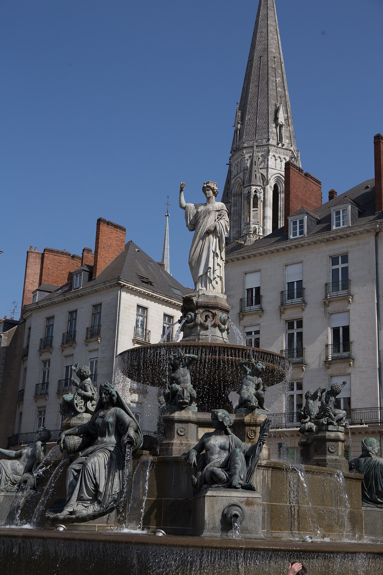 The fountain and classical façades of Place Royale in Nantes